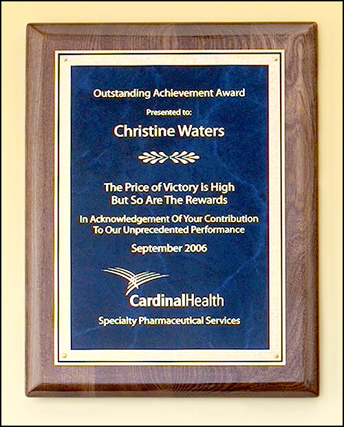 Walnut stained piano-finish plaque with sapphire marble center and florentine border engraving plate