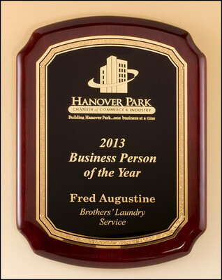 Rosewood piano-finish plaque featuring a gold florentine border with textured black center engraving plate