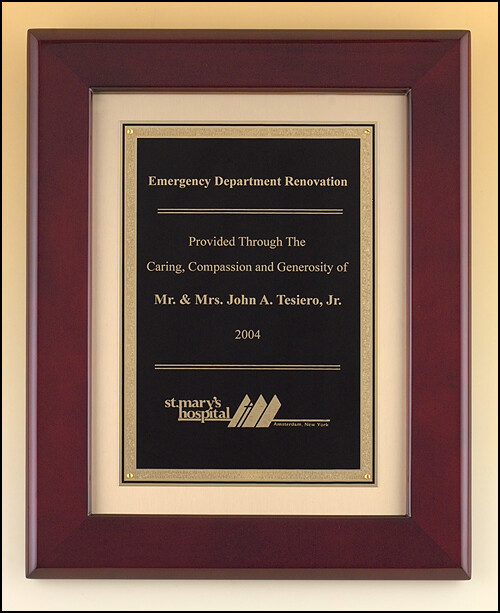 Cherry finish frame plaque with antique bronze finished frame on brushed metal gold background