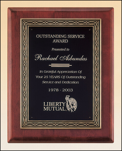 Rosewood stained piano finish plaque with an antique bronze finished frame casting and black brass engraving plate