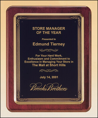 Rosewood stained piano finish plaque with antique bronze plated metal frame casting
