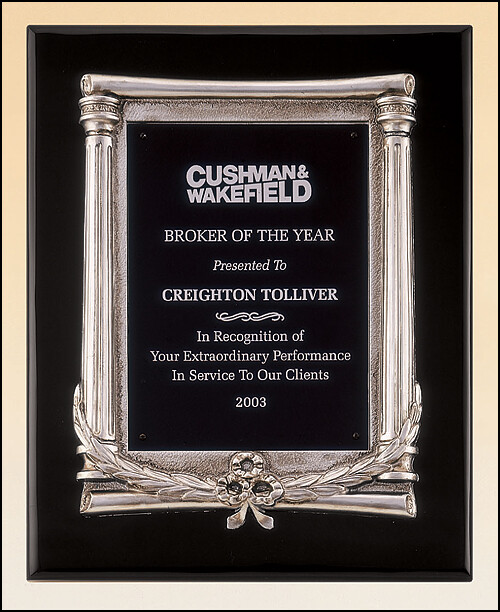 Black stained piano finish plaque with an antique silver finished frame casting and black aluminum engraving plate