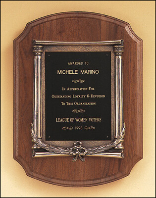 Solid American walnut plaque with an antique bronze casting