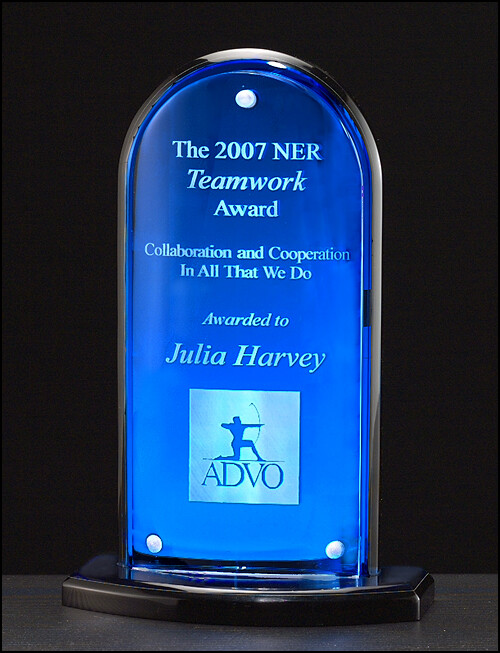 Arch Series featuring blue mirror upright and base with clear convex acrylic front