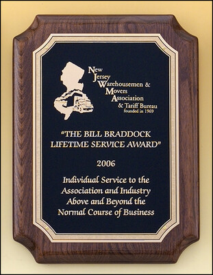 Walnut stained piano-finish plaque with black textured center and florentine border plate