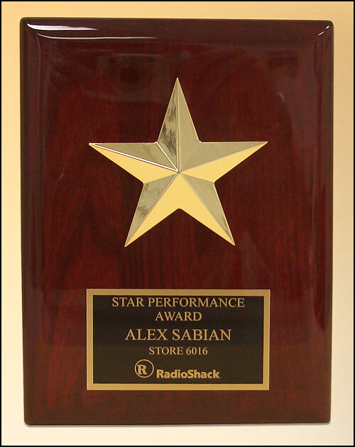 Star casting with gabled points goldtone finish on rosewood piano-finish plaque