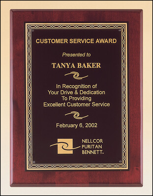 Rosewood stained piano finish plaque with a black brass plate and gold braided design border