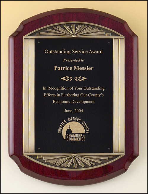 Rosewood stained piano finish plaque with an antique bronze finished frame casting and black brass engraving plate