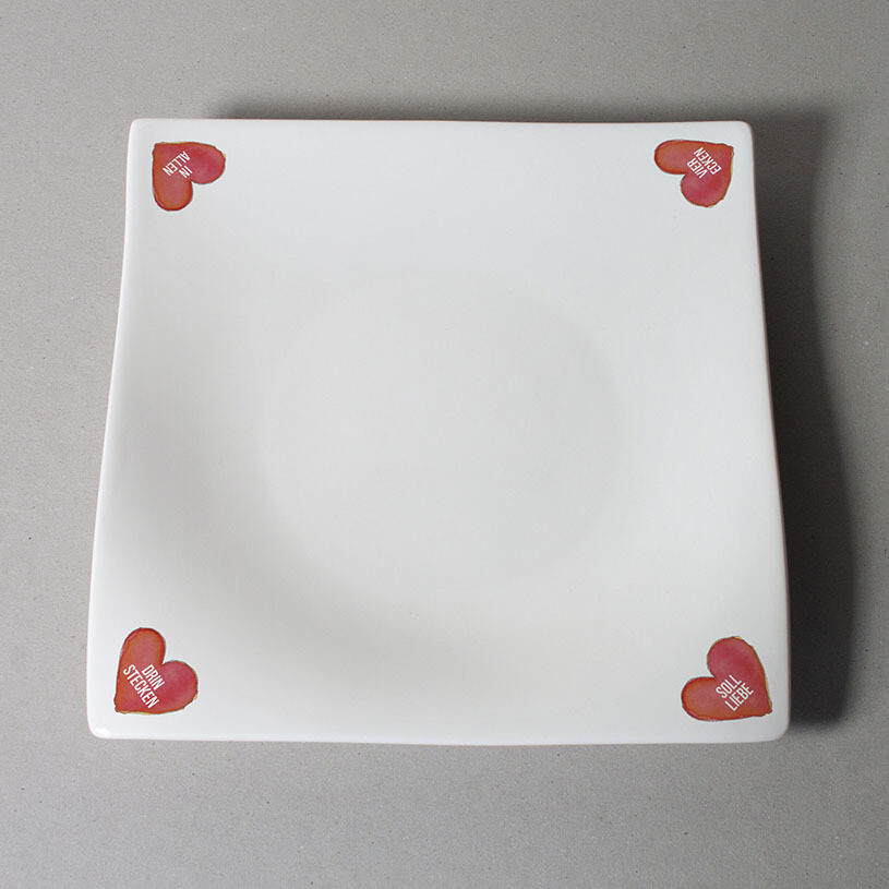 "In allen vier Ecken..." (Teller, eckig, groß)