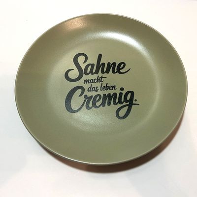 "Sahne macht das Leben cremig", (Teller)