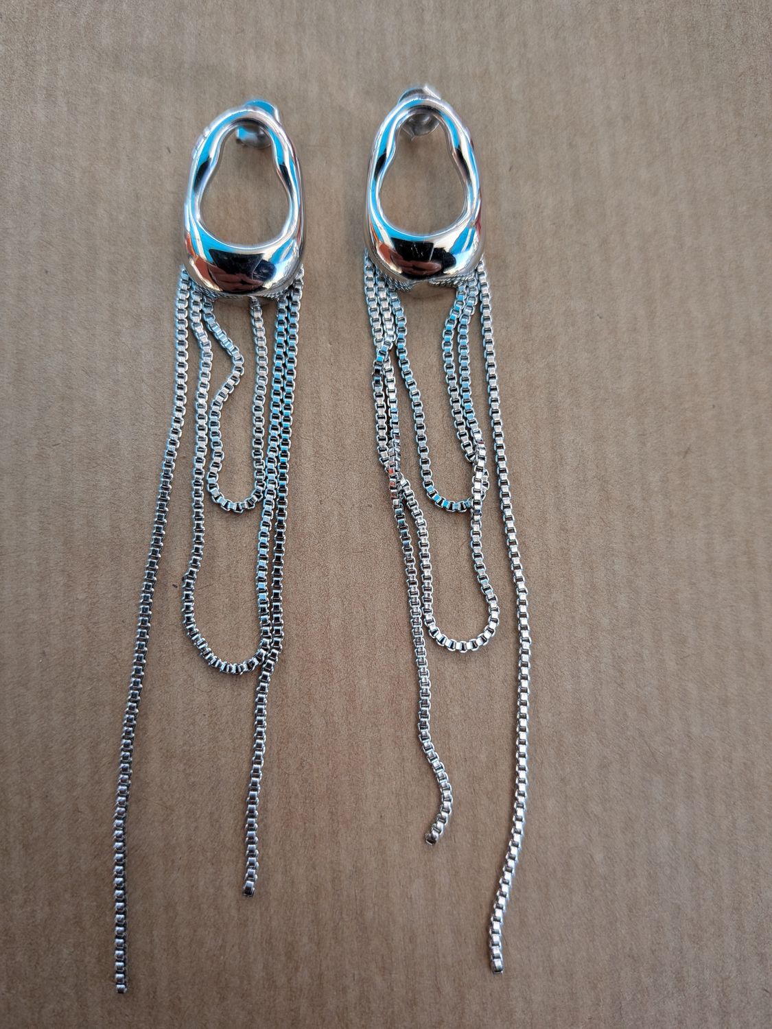 Boucle d'oreille "cascades de chaînes argentées"