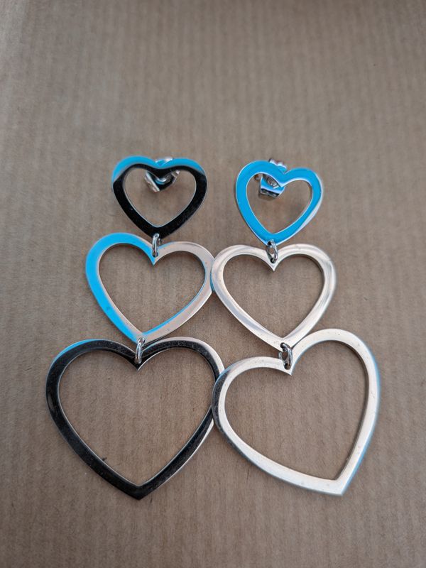 Boucle d'oreille "triple cœur"