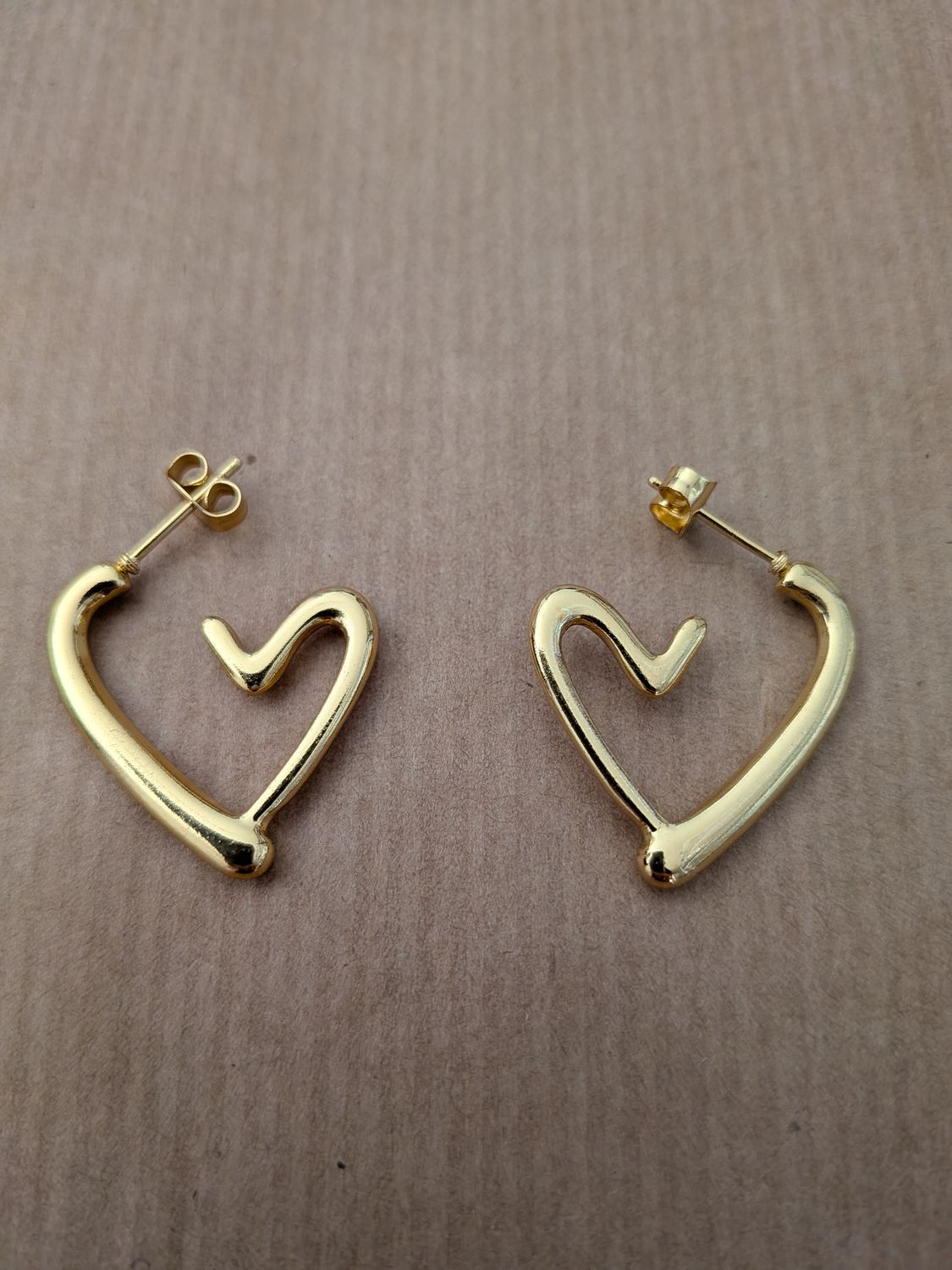 Boucle d'Oreille L'Amour Fluide – L'élégance des lignes