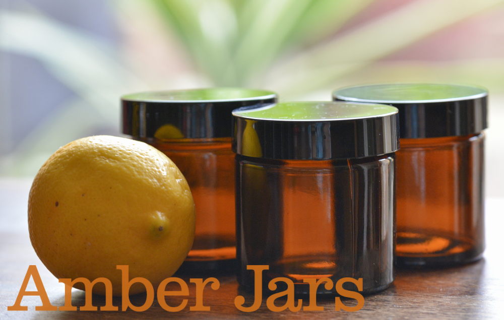9 x 60ml Glass Amber Jars with Black or silver Wadded Lid.