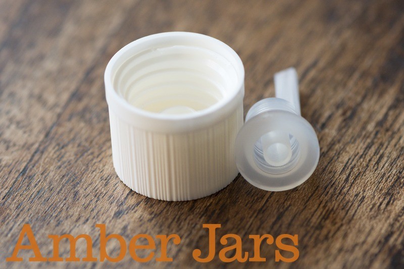 Tamper Evident Child Resistant White Cap with Dripolator insert