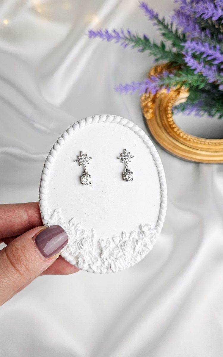 Earrings with Star in Moissanite