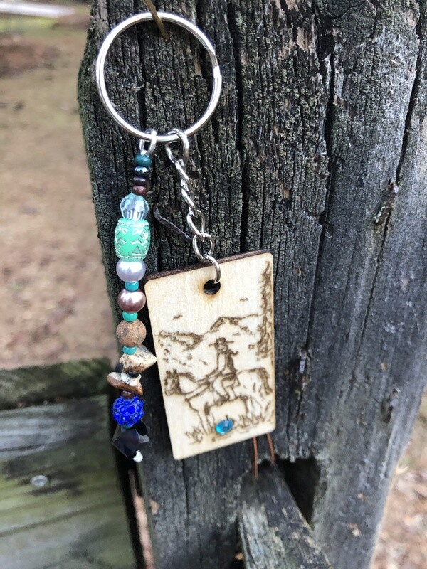 "A Cowgirl and Her Horse" light blue bling keyring backpack or saddle tag