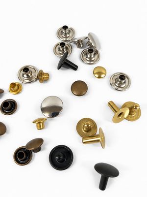 Tubular rivets for garment making and leather goods