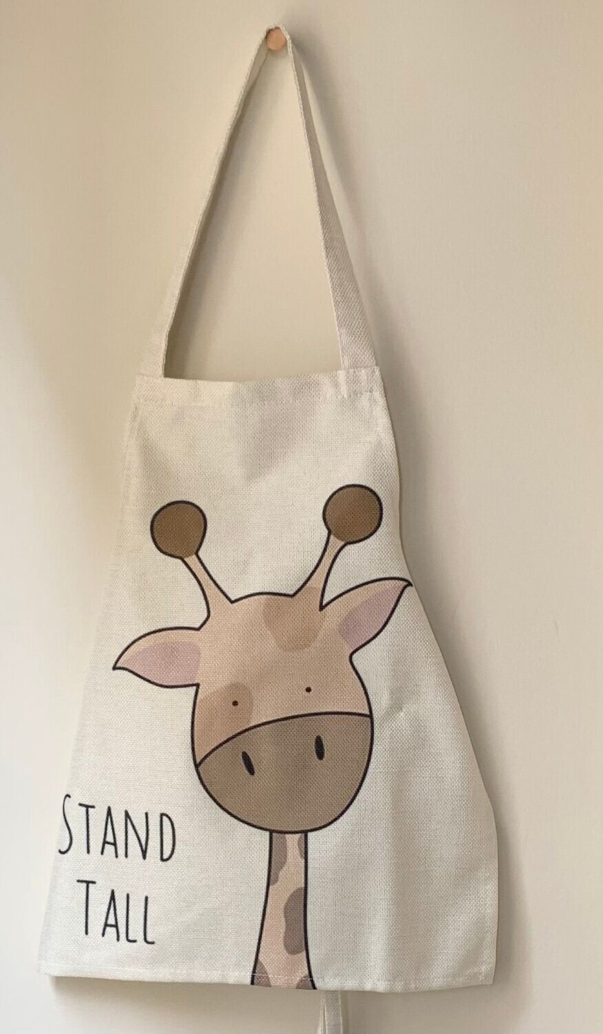 DELANTAL INFANTIL JIRAFA