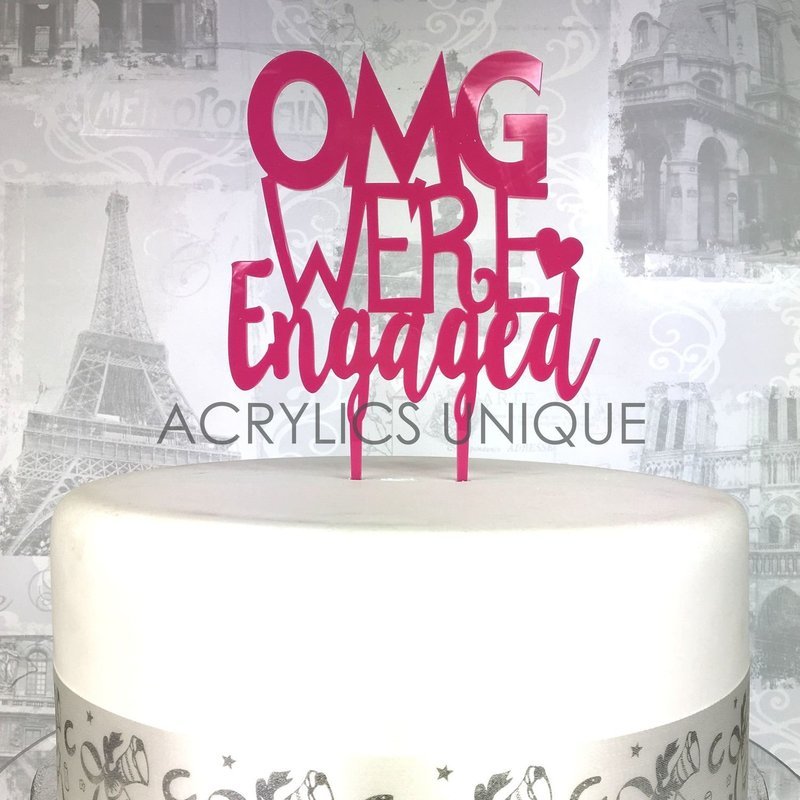OMG We're Engaged cake topper