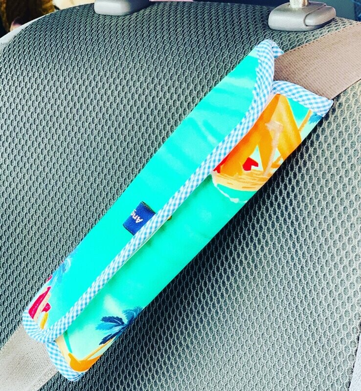 Protector para el hombro en el coche