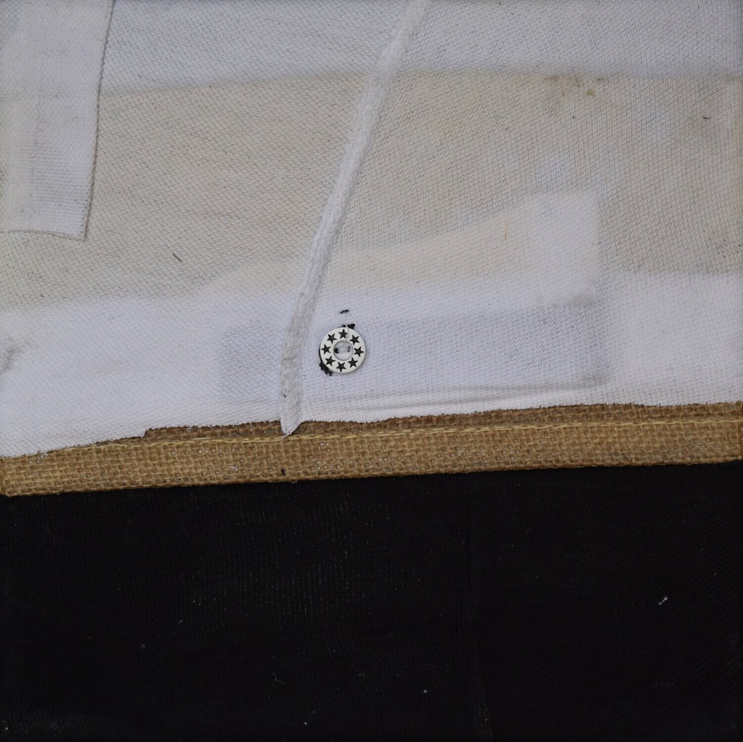 Collage  Clothes  on Canvas on a wooden frame // Size: ca. 20 x 20 x 4 cm,