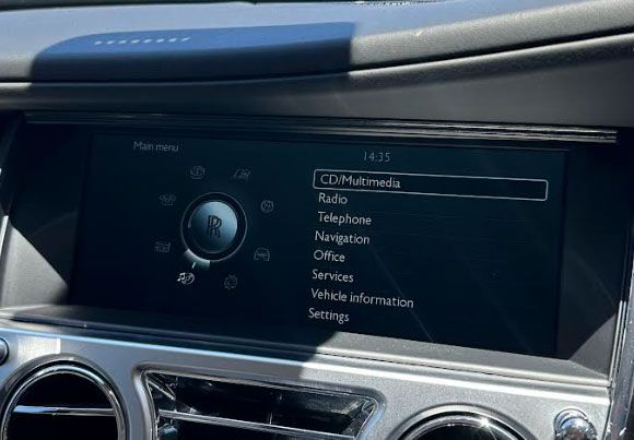 Rolls-Royce Ghost, Wraith, or Phantom equipped with the Car Information Computer (CIC) infotainment system by integrating Apple CarPlay and Android Auto