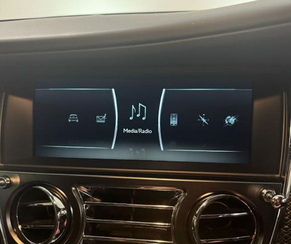 Rolls-Royce Ghost, Wraith, or Phantom equipped with the NBT EVO infotainment system by integrating Apple CarPlay and Android Auto