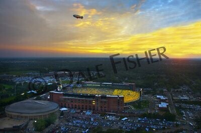 Good Year Blimp over Michigan Stadium at Sunset