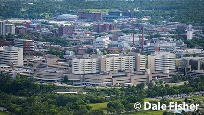 University Of Michigan Hospital with stadium in the summer-#9563
