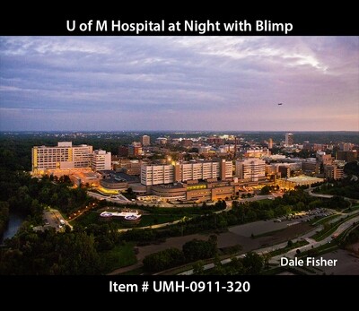 U of Michigan Hospital at Night with Good Year Blimp