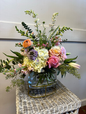 Low Pilotis Vase With Spring Arrangement