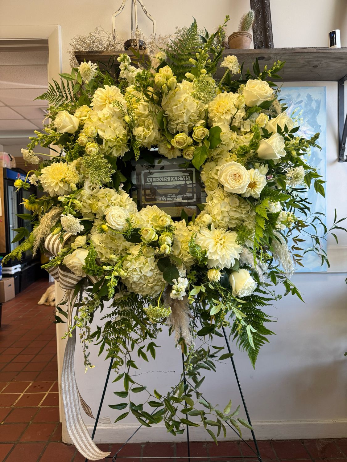 Floral Wreath On Easel With Custom Picture