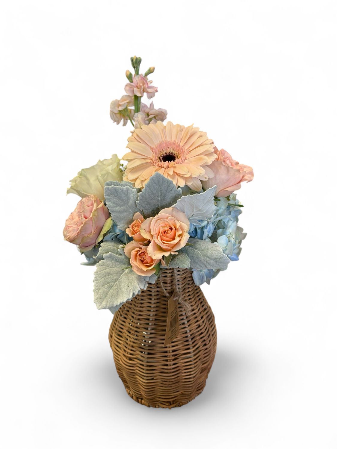 Hand woven Rattan vase with fresh florals