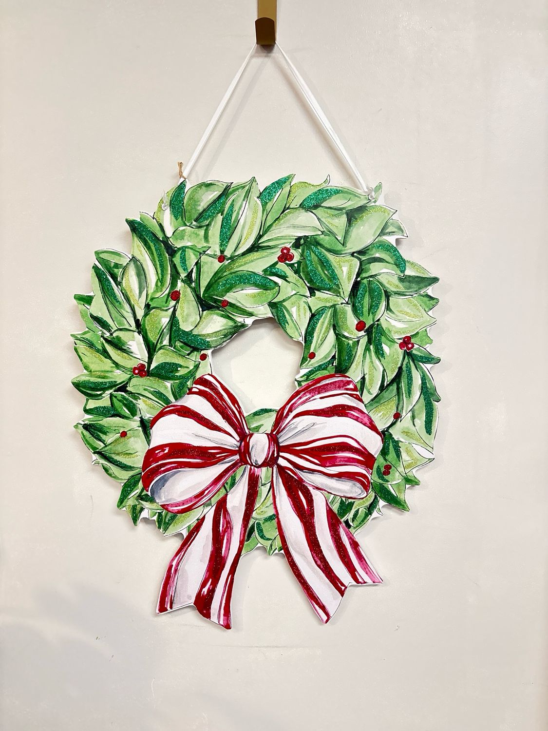 Wreath with candy cane bow Wreath with candy cane bow