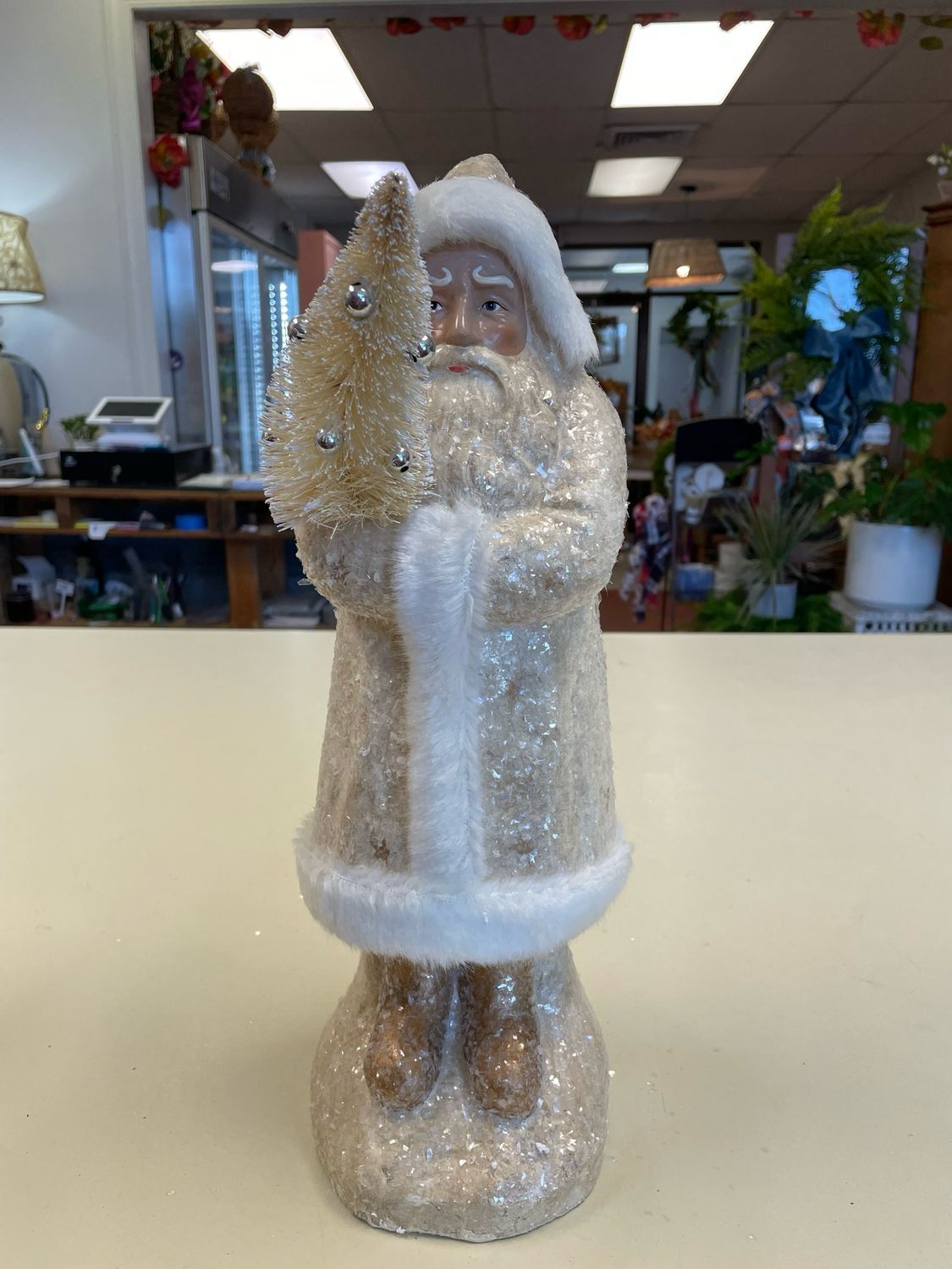 Paper Mache St Nick holding christmas tree Paper Mache St Nick holding christmas tree