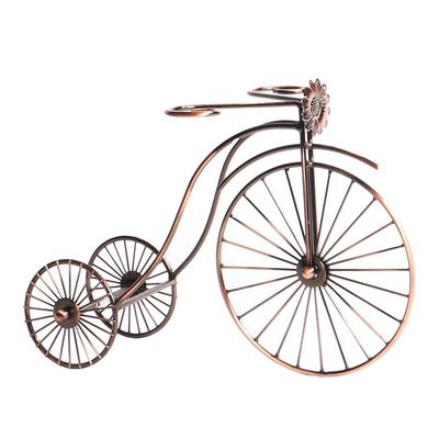 PORTA VINO CARRUAGEM REAL 32X17X23 COLOR BRONCE EN METAL