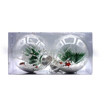 BOLA NAVIDEÑA TRANSPARENTE CON NIEVE Y PINO 10CM 2PZS
