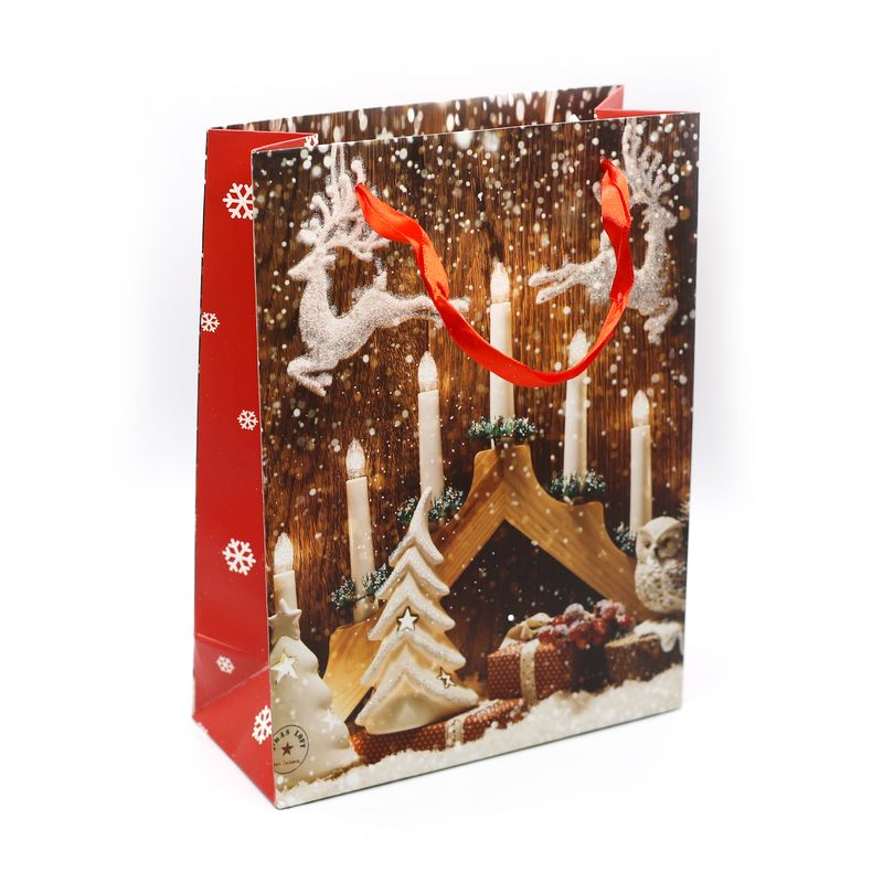 BOLSA NAVIDEÑA ROJA CON VELAS Y COPOS DE NIEVE TAMAÑO P