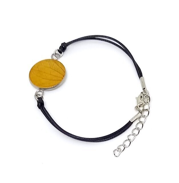 Bracelet cordon/inox, pétale d'Hortensia jaune orangé. D20mm