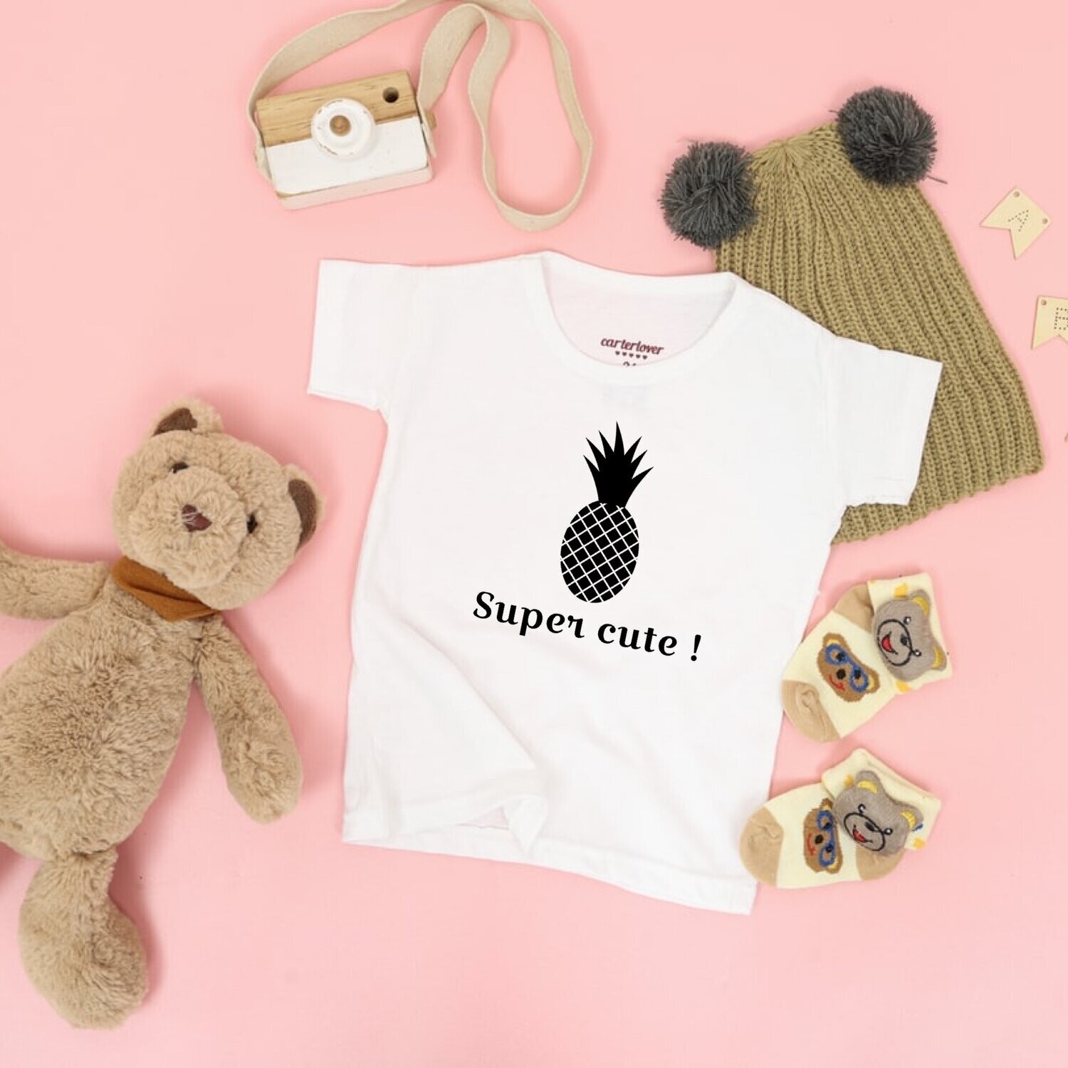 White T-shirt with pineapple logo and &quot;Super Cute&quot; printed on it