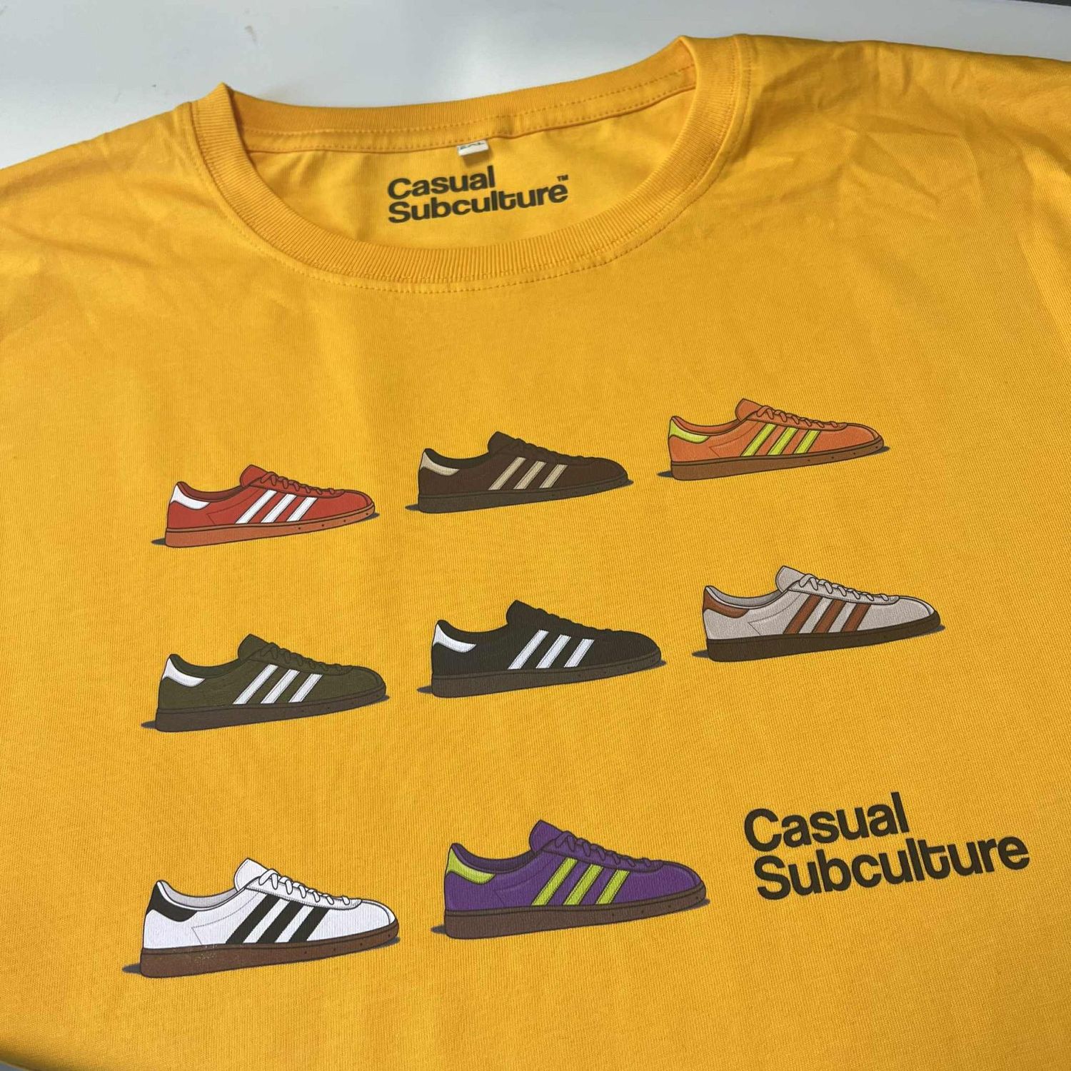 Munchen Trainer T Shirt - Gold - 2XL