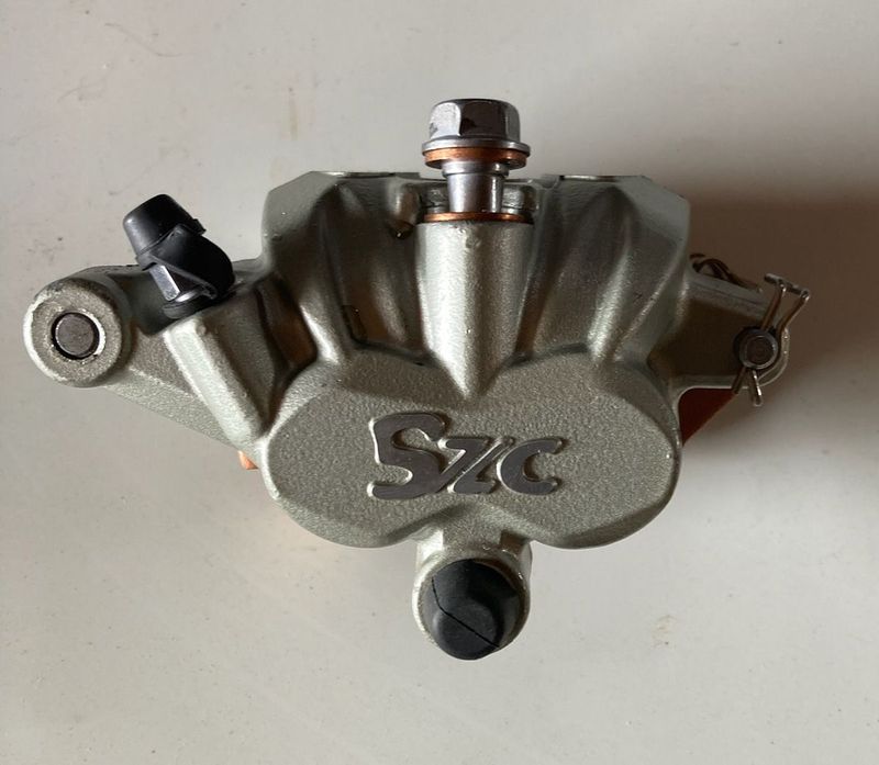 SZC front brake caliper. Fits all full GPX machines with SZC brakes.