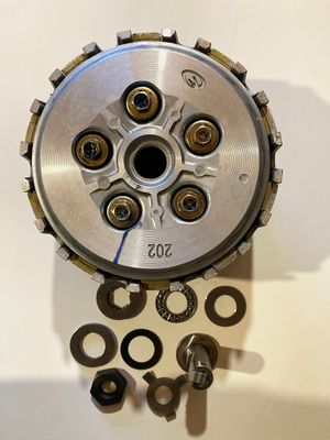 Clutch Assembly includes basket, all discs, and hardware. Fits TSE250 & Kayo KT250 Clutch Assembly includes basket, all discs, and hardware. Fits TSE250 & Kayo KT250