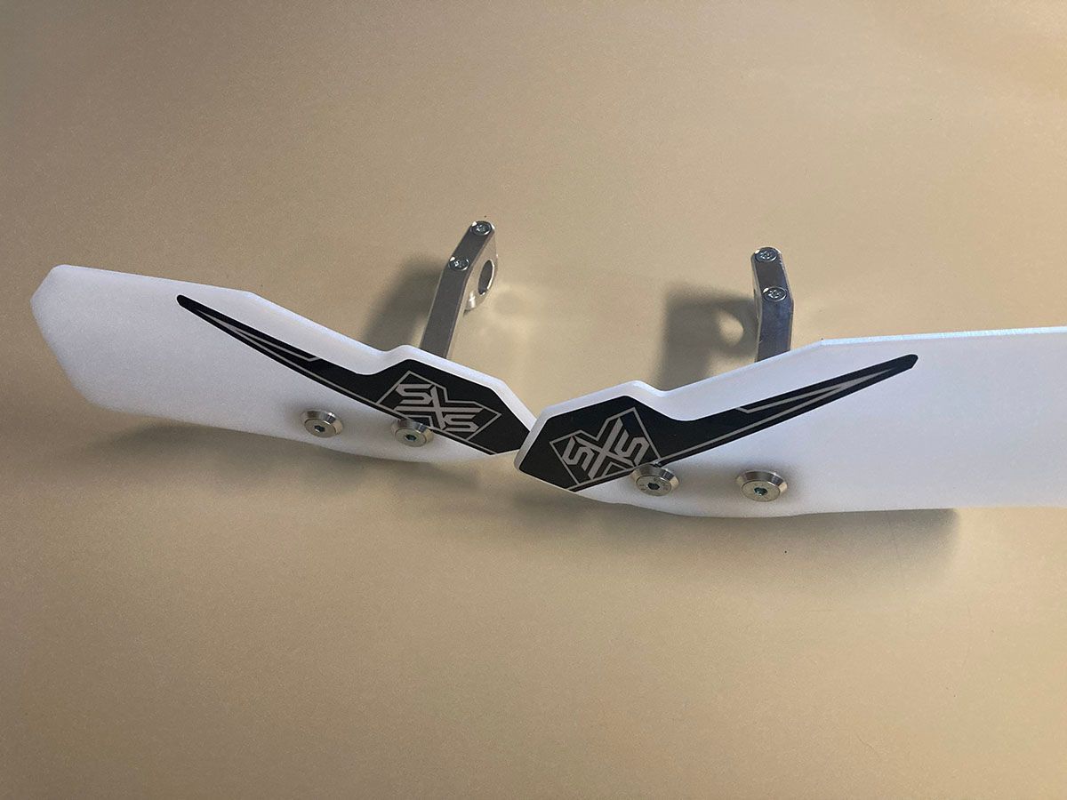 SXS Super Burly Hand Guards with Heavy Duty Aluminum Mounts. These flag type hand guards are so strong, they protect your levers like full wrap hand guards. Comes as a set.