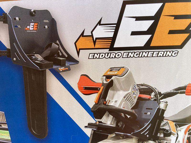 Enduro Engineering Chain Saw Mount for motorcycles. Mounts to front forks, handles up to a 14 Enduro Engineering Chain Saw Mount for motorcycles. Mounts to front forks, handles up to a 14" chainsaw.