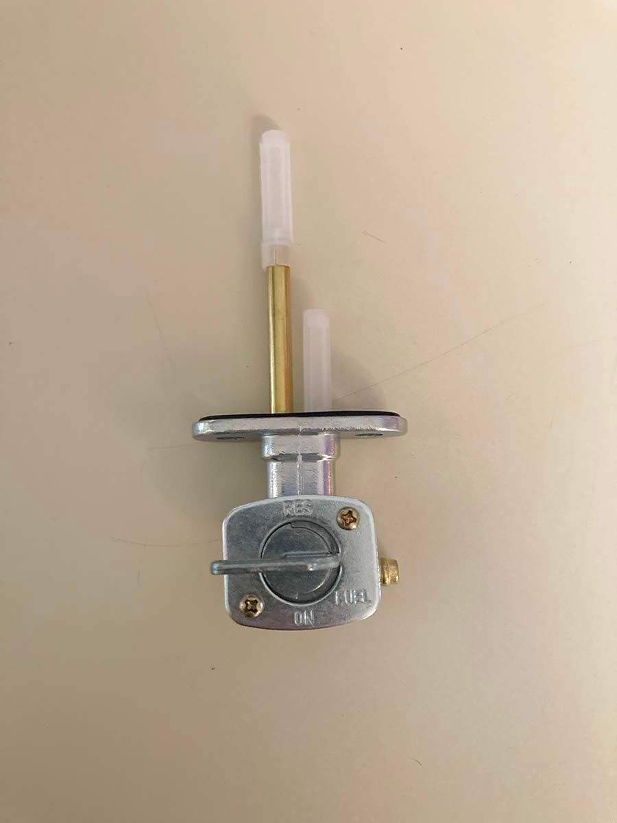 Fuel Petcock with reserve. 35mm center screw hole spacing, fits 1/4" fuel lines.