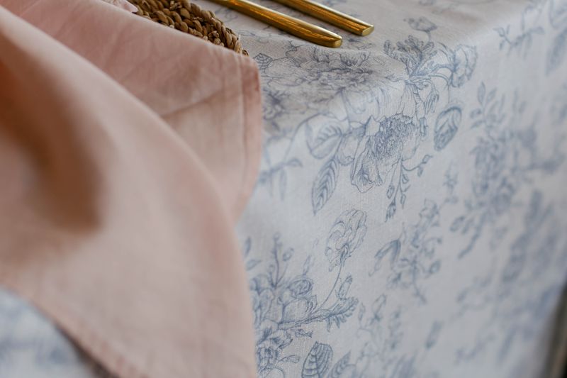 Floral print linens / napkins and trestle cloths