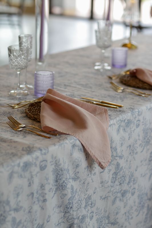 Floral print linens / napkins and trestle cloths