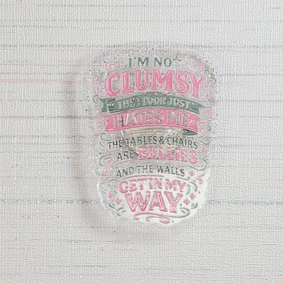 Cover Minder I'm not clumsy, the floor just hates me,  the table and chairs are bullies and the walls get in my way